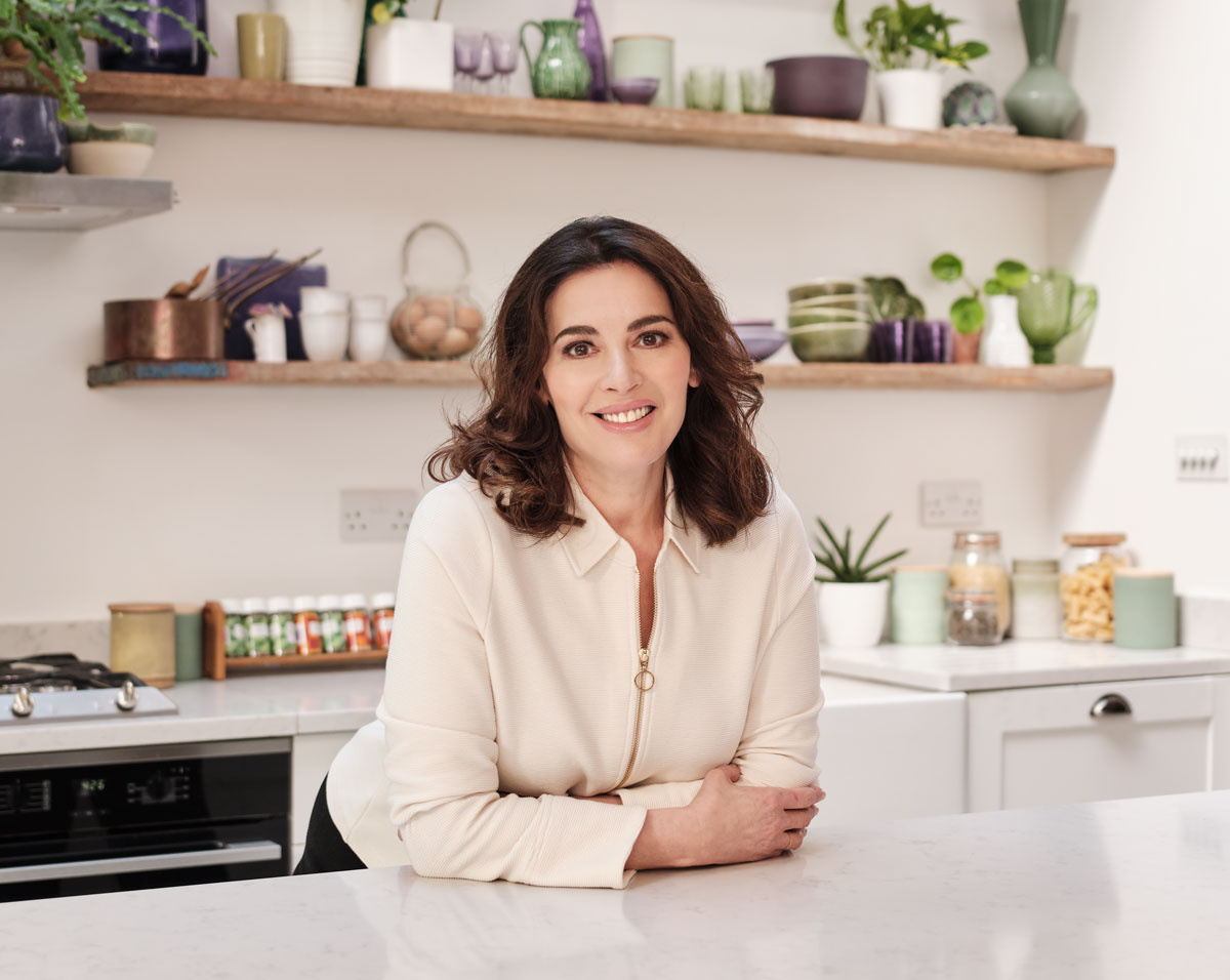 Image of Nigella leaning on counter