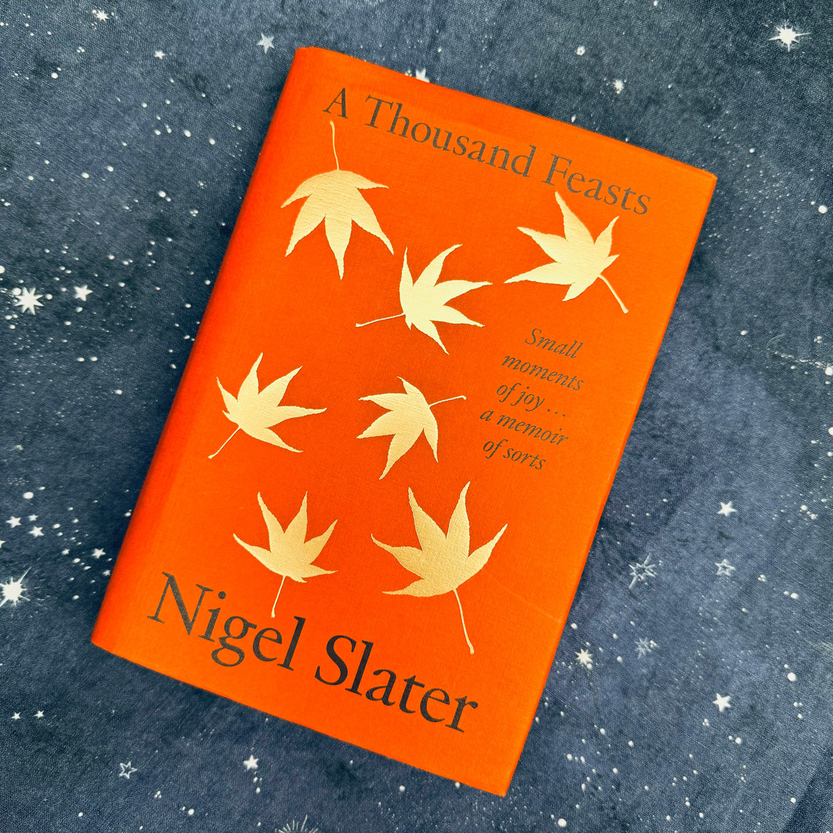 Book cover of A Thousand Feasts by Nigel Slater