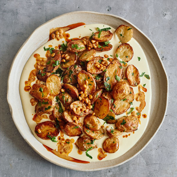 Image of Noor Murad and Yotam Ottolenghi's Roasted Potatoes with Aioli and Buttered Pinenuts